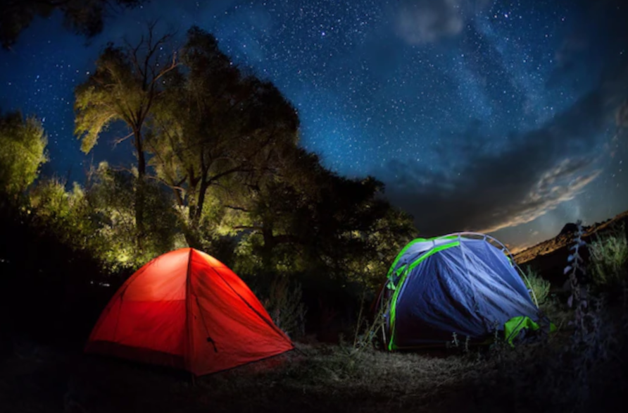 tent camping under starry night